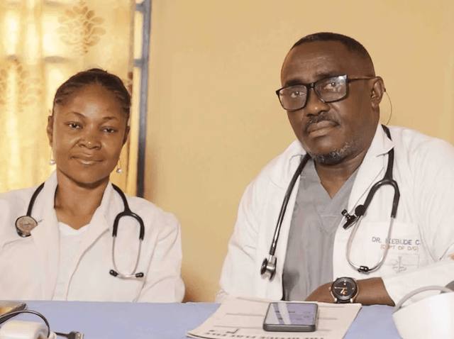 Two doctors in white coats with stethoscopes at a DOGO partner hospital.